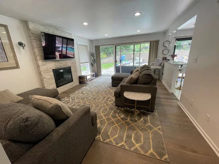 Posh Pittsburgh living room opening toward the pool terrace